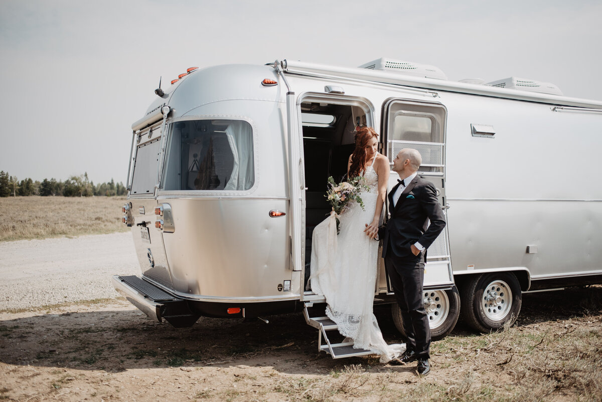 Jackson Hole photographers capture bride walking into rv