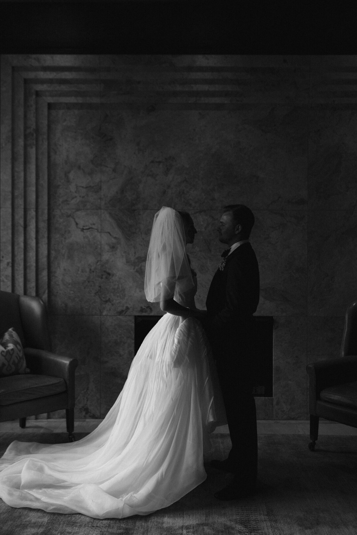 Film photography captures editorial ceremony moments at Old Post Office Chicago with Lauren Alatriste's fashion forward approach, showcasing architectural beauty while maintaining sophisticated luxury wedding imagery and authentic emotional storytelling.