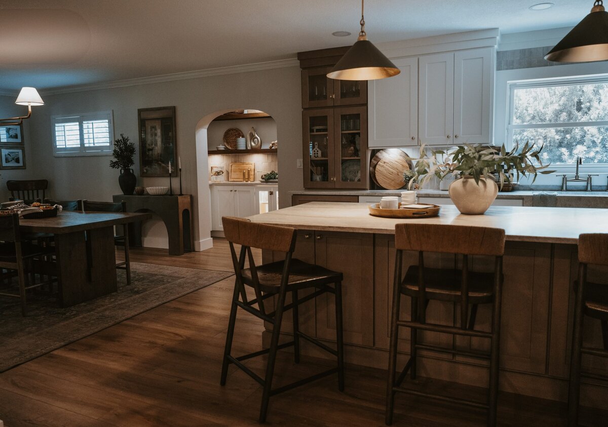 dewine design orlando interior design vintage cove trail kitchen with gold island pendent lighting and wood floors