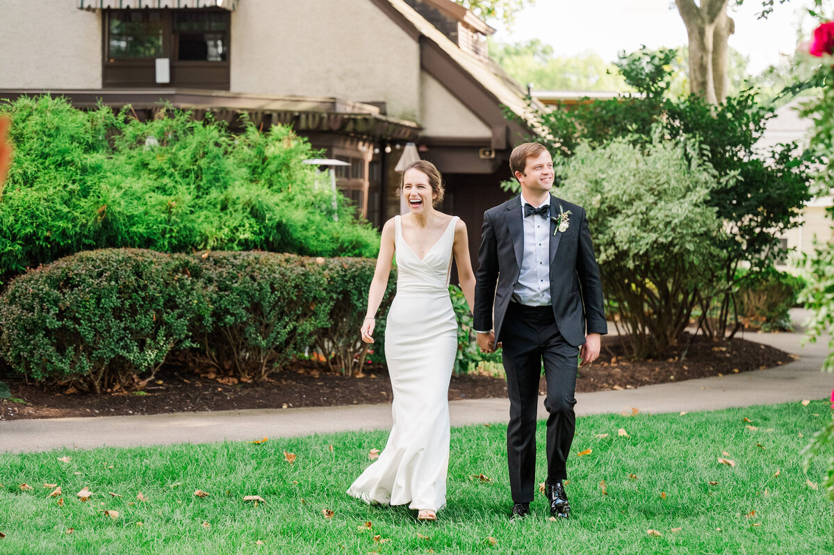 garden wedding event couple being introduced into their tented reception