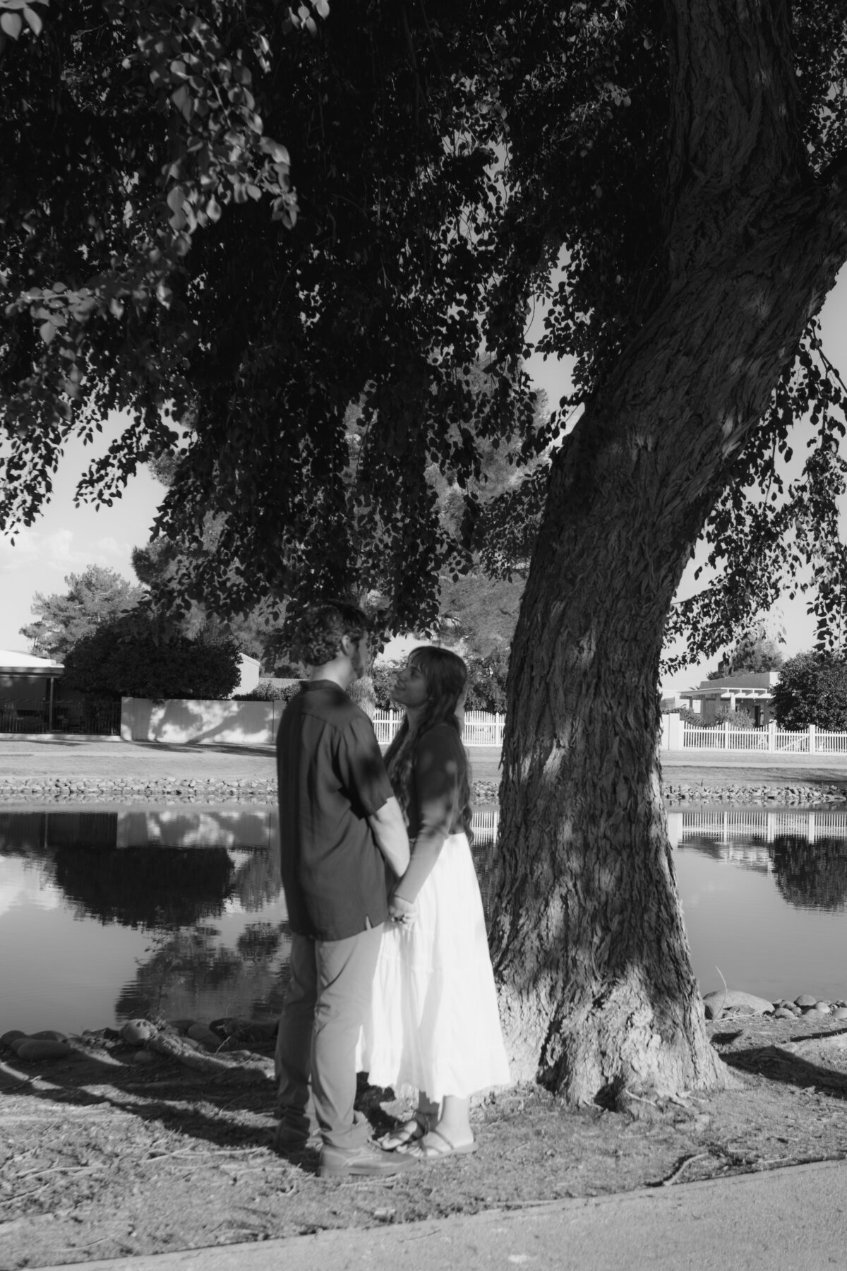 Jovanna G Photography. Classic, sophisticated Wedding Photos. Soft romantic engagement photos. Soft romantic WeddingPhotos. Sophisticated Wedding Photographer. Professional Wedding Photographer. Destination Wedding Photographer. Luxury Wedding photographer. Traveling Wedding Photographer. AZ Wedding Photographer. Gilbert AZ Wedding Photographer. Queen Creek Wedding Photographer. Phoenix Wedding Photographer. Scottsdale Wedding Photographer. Flagstaff Wedding Photographer. SoCal Wedding Photographer. California Wedding Photographer. Northern California Wedding Photographer. Southern California Wedding Photographer. San Francisco Wedding Photographer. Bay Area Wedding Photographer. San Jose Wedding Photographer. Golden Gate Bridge Wedding Photographer. Beach Lover Wedding Photographer. Palace of the Fine Arts Wedding Photographer. Ocean Lover. I love California. Orange County Wedding Photographer. Newport Beach Couples Photographer. Newport Beach Wedding Photographer. Laguna Beach Couples Beach Engagement Photographer. Laguna Beach wedding beach photographer. Los Angeles Wedding Photographer. Young and in love engaged couples who live in southern California. Christian Young Couple. Young Engaged Couple. Engaged High School Christian Couple. Christian Values. Young conservative Christian women. Young Conservative Christian men. Young Conservative Christian Couple. Young Christian Couple Engaged in High School. Young Christian College Couple. Lakeside Lovers in the Autumn Sun. David & Grace - engagement photos. Jovanna G Photographer Engagement Photos. Arizona sun shining through autumn trees- engagement. Chandler, AZ Engagement Photos. Chandler, AZ 2026 bride. Chandler, AZ Wedding Photographer. Chandler, AZ Young Engaged Couple. Girl in her 20s. Engaged Arizona Girl in her 20s. Lakeside Engagement photos. AZ Lakeside Engagement Photos. AZ Weeping Willow Lakeside Proposal. Arizona Lakeside Proposal with weeping willow tree. Detail shot of engagement ring on Arizona Lakeside estate. Chandler, AZ Lakeside Estate Proposal Outfit Inspiration.