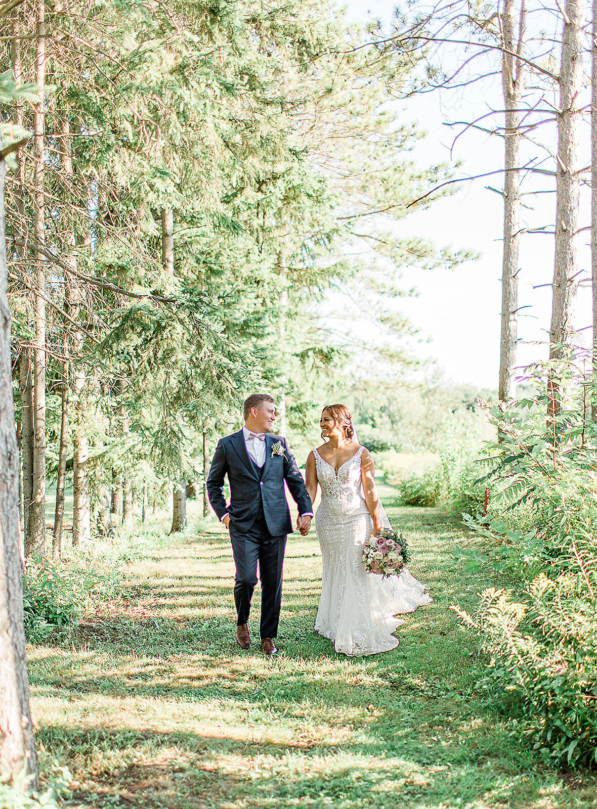 bride and groom at Royal Ashburn walking the trails