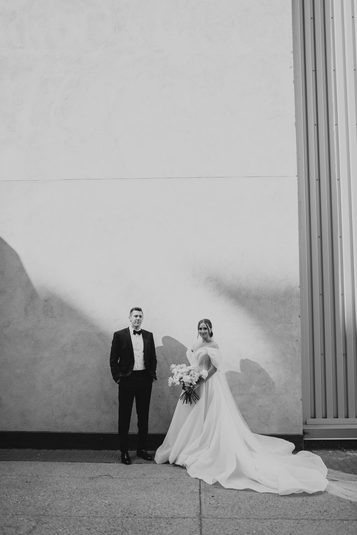 Black and white portrait of a bride and groom.