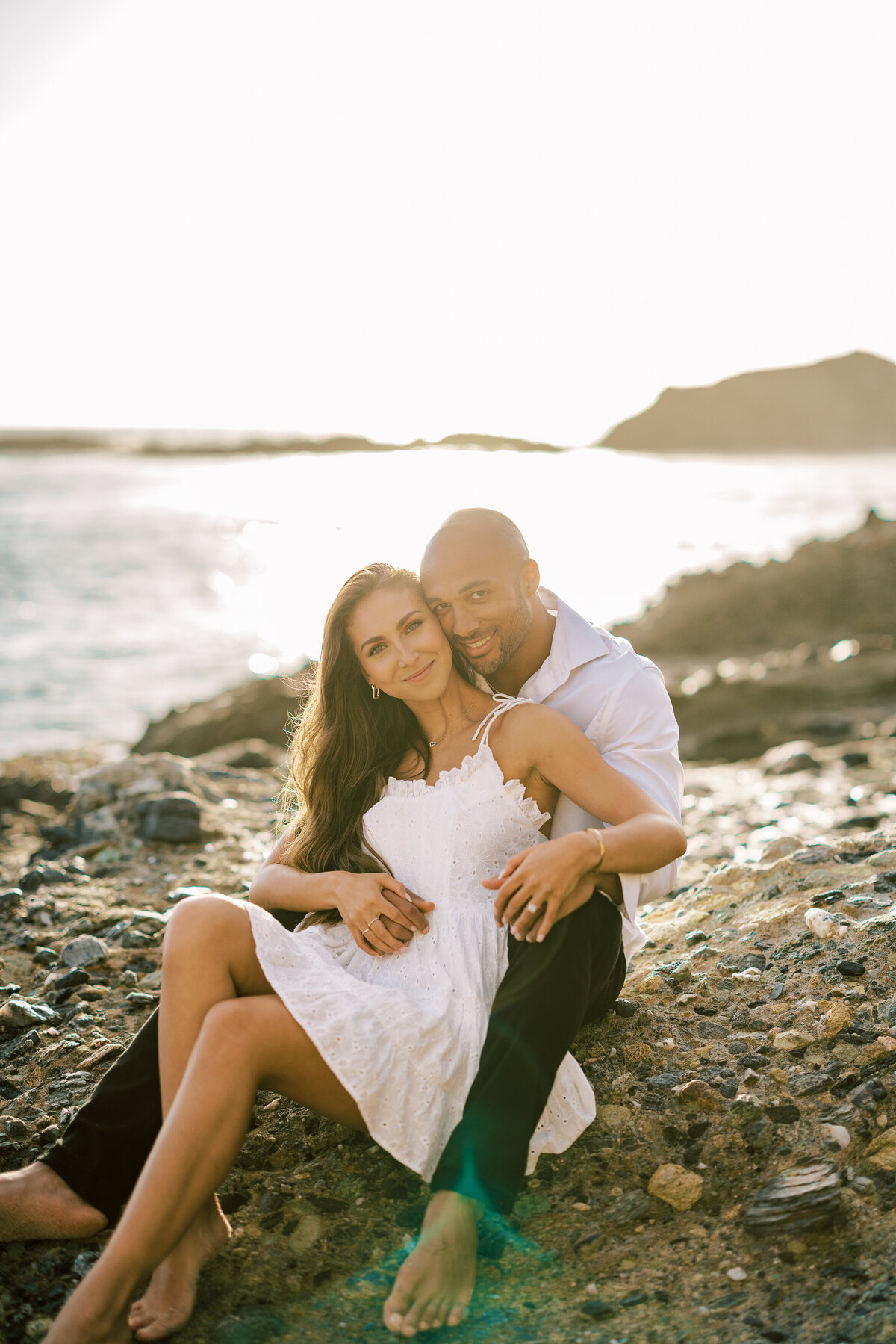 warm and candid beach engagement photo