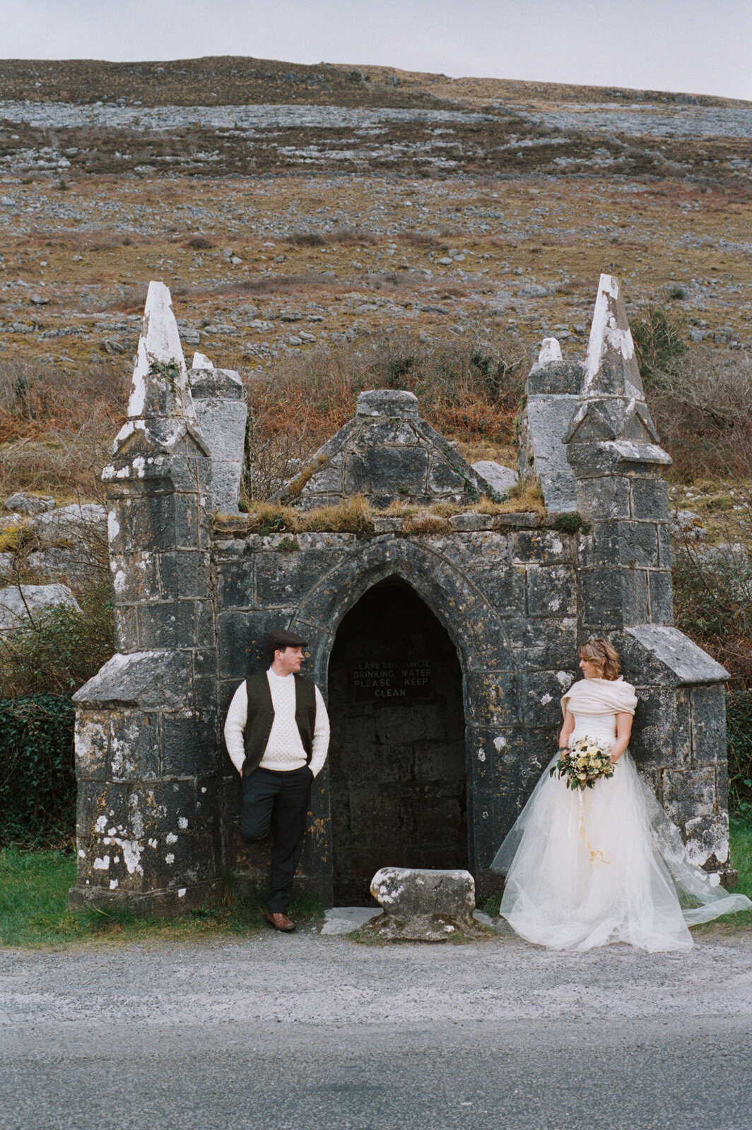 Kate-Murtaugh-Events-Ireland-international-destination-wedding-planner-Irish-elopement-couple-County-Clare-wildflower-bouquet-ancient-relics-first-look