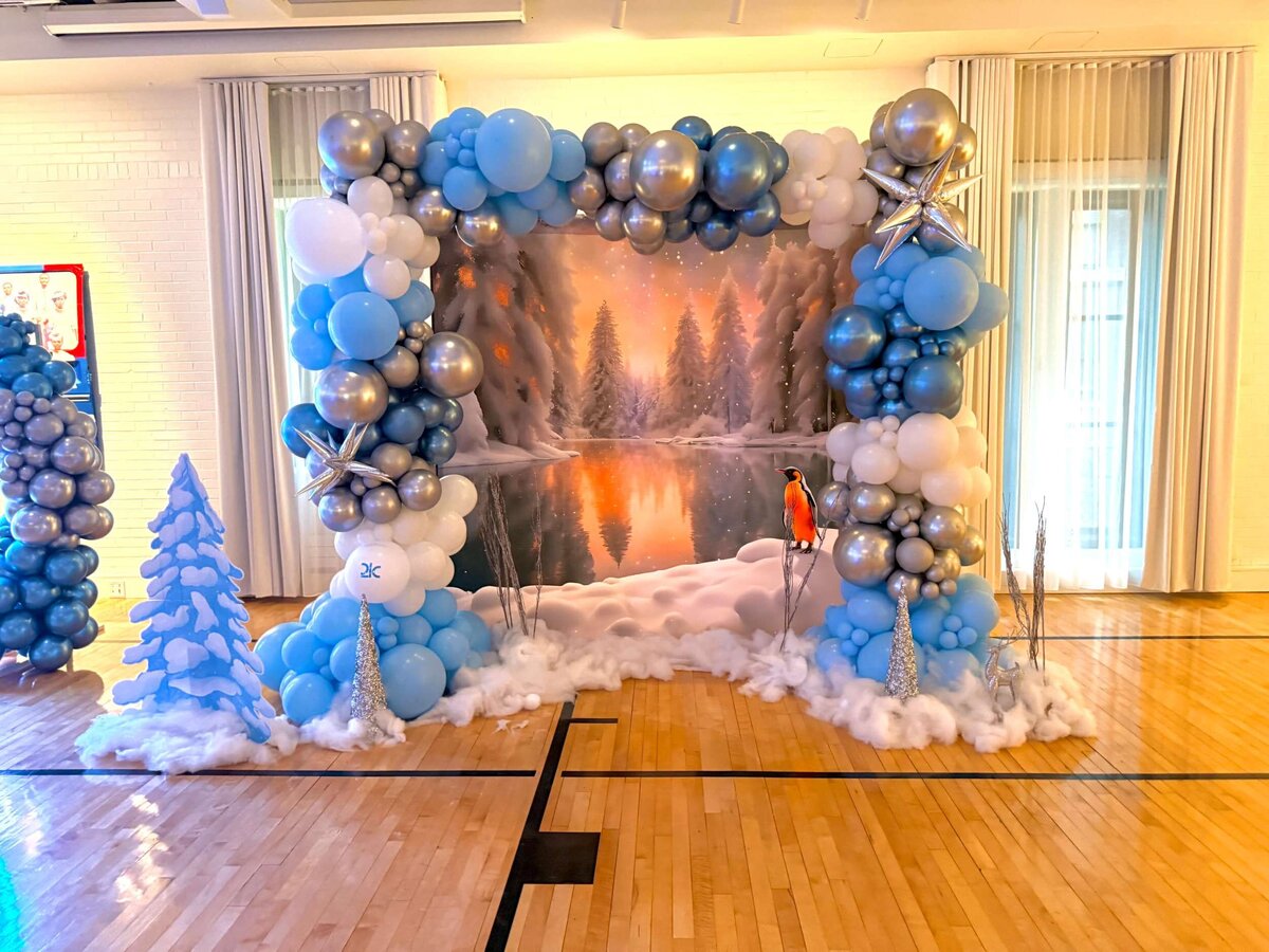blue and silver holiday balloons in STL