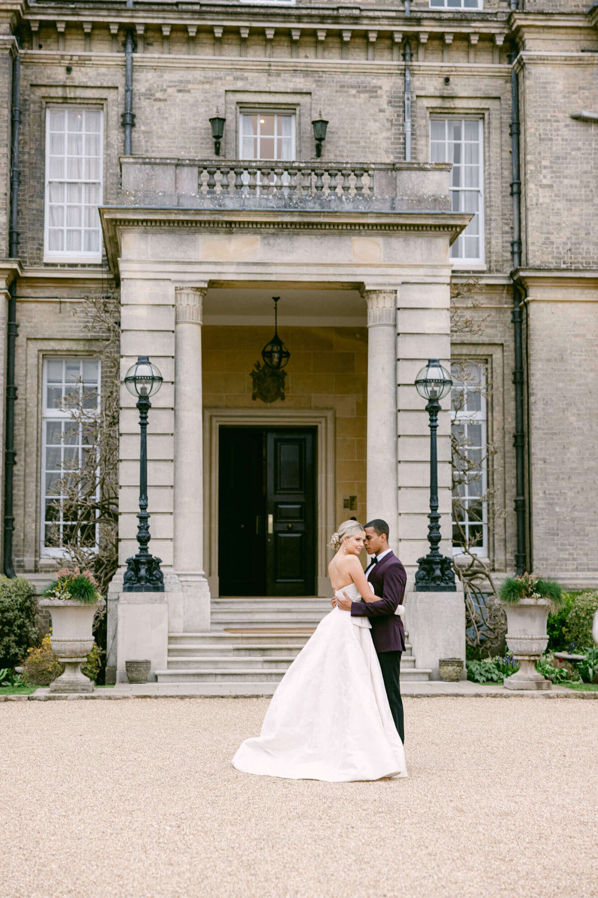 A wedding day photo of the bride and groom at Hedsor House in the Uk