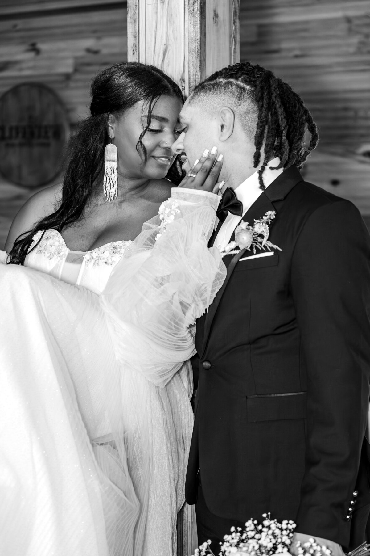 Bride and groom next to bar at their wedding