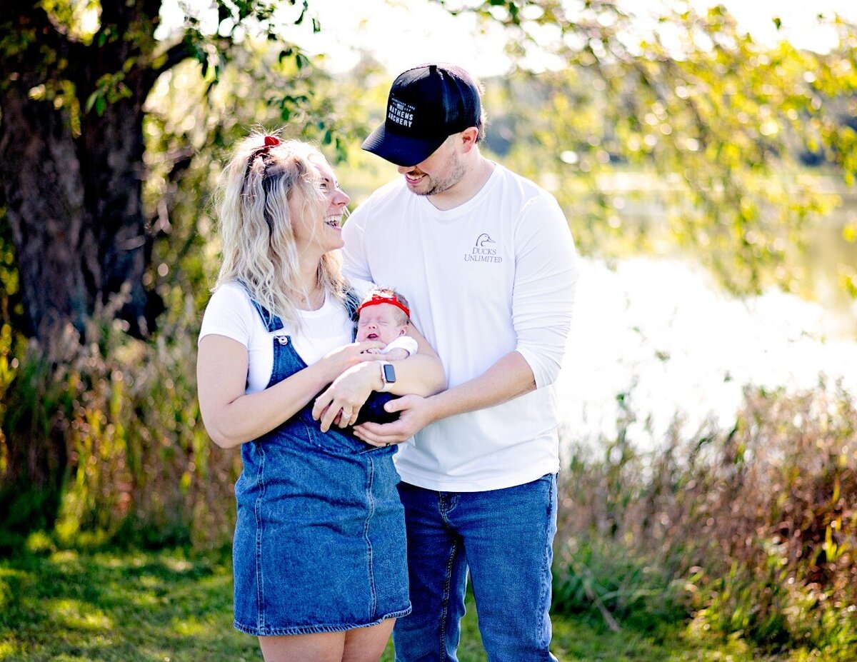 baby with parent outside