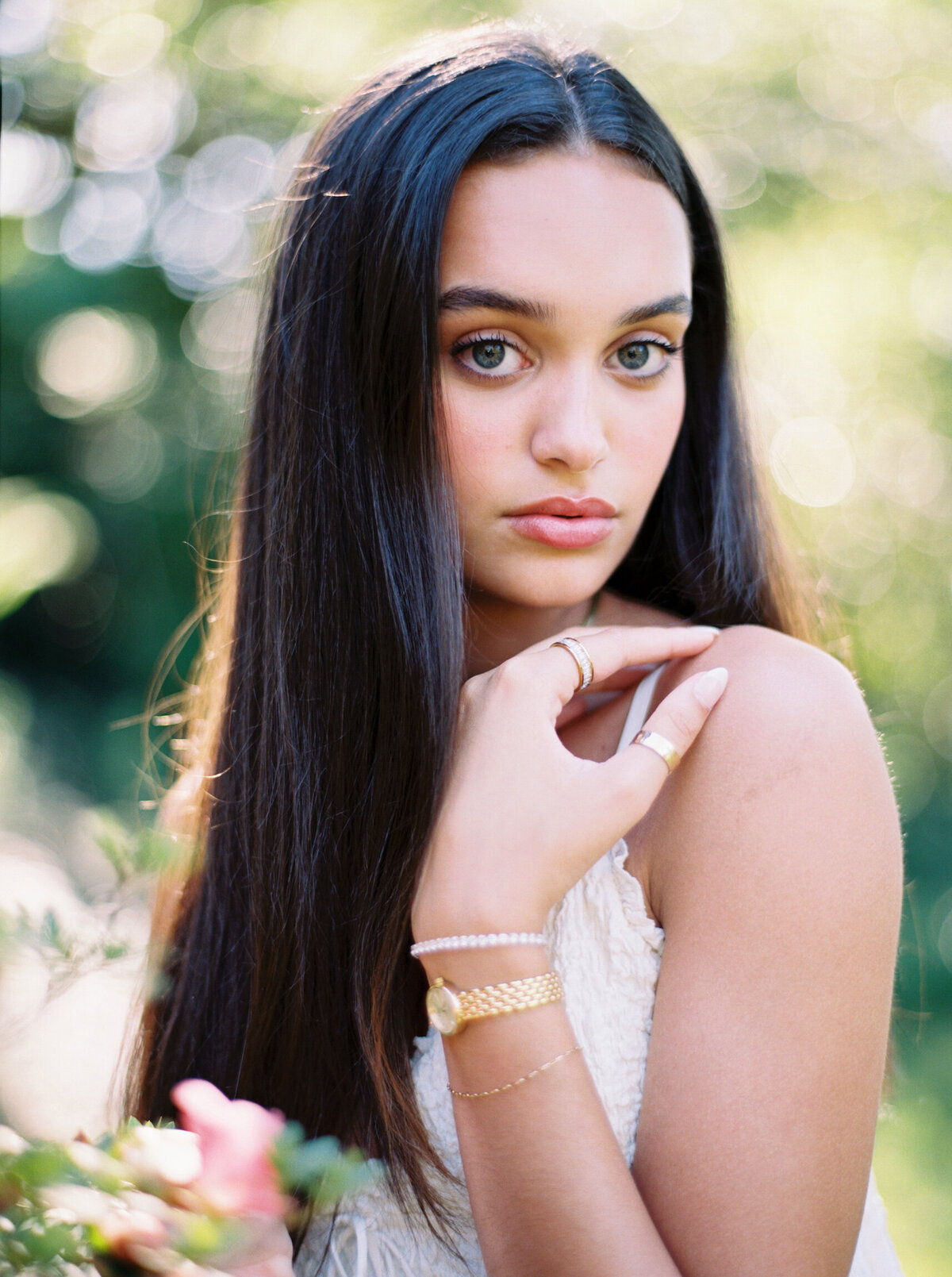 Senior portrait taken among the beautiful landscapes of Rip Van Winkle Gardens, captured on film by Morgan Alysse, Louisiana film photographer.