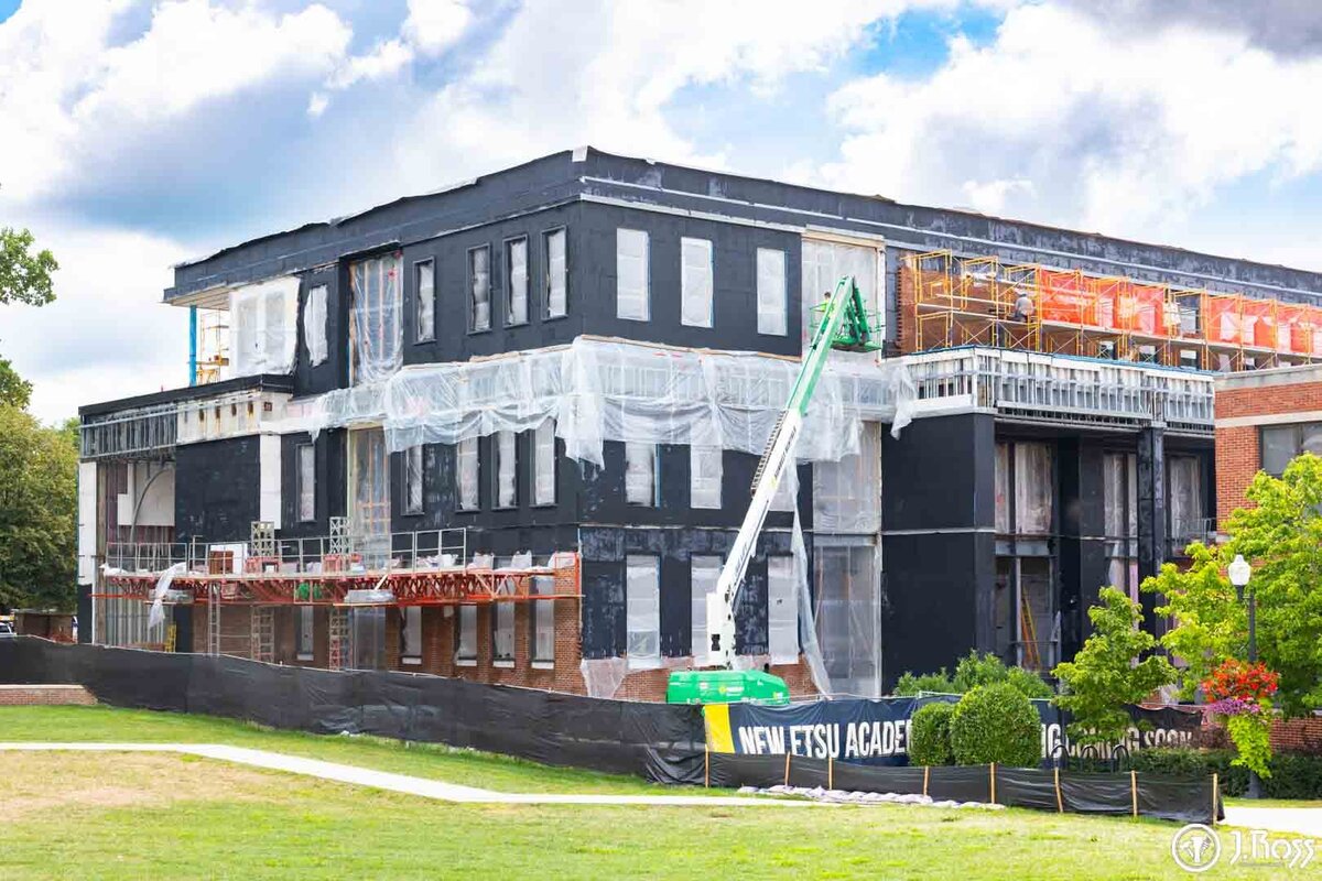 Exterior view of the new ETSU Academic Building under construction in Johnson City, TN, by J.Ross Painting & Drywall.