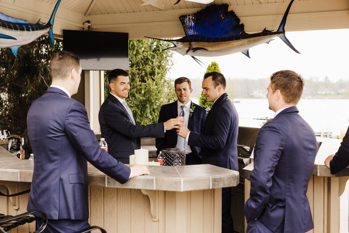 Groomsmen drinking