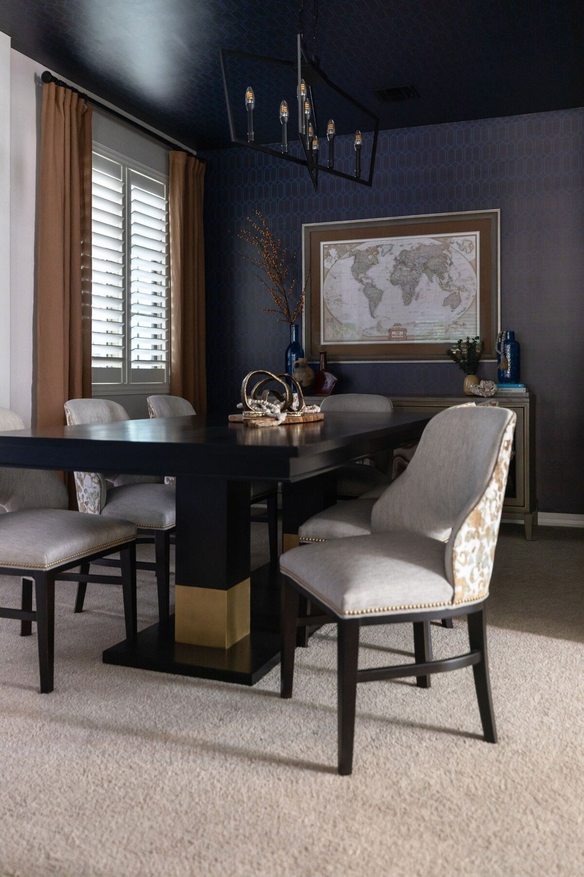 Row of custom velvet dining chairs with gold accents and nailhead trim in a sophisticated Scottsdale dining room