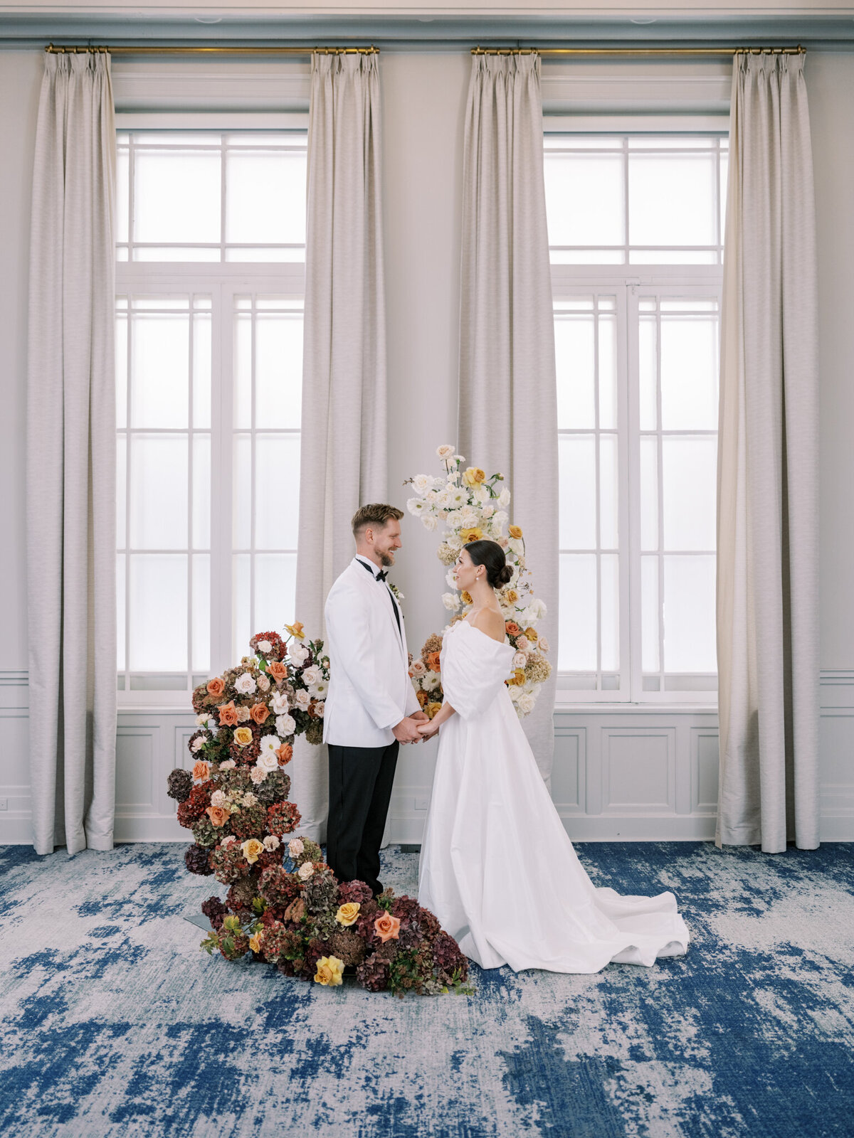 Beautiful and elegant couple during ceremony at the Fairmont Palliser in Calgary, AB. Featured on the Bronte Bride Vendor Guide.