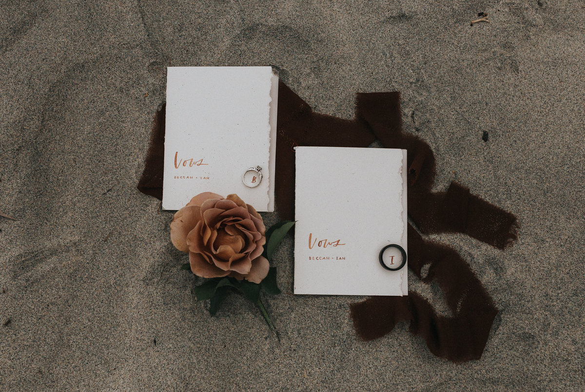 Vow books during an elopement in California.