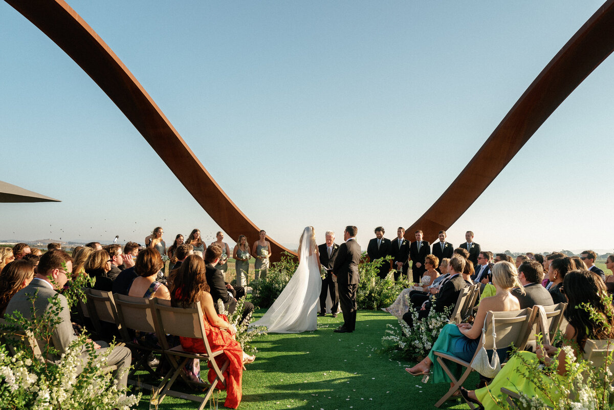 bride and groom during wedding ceremony on infinity hill at stanly ranch napa california