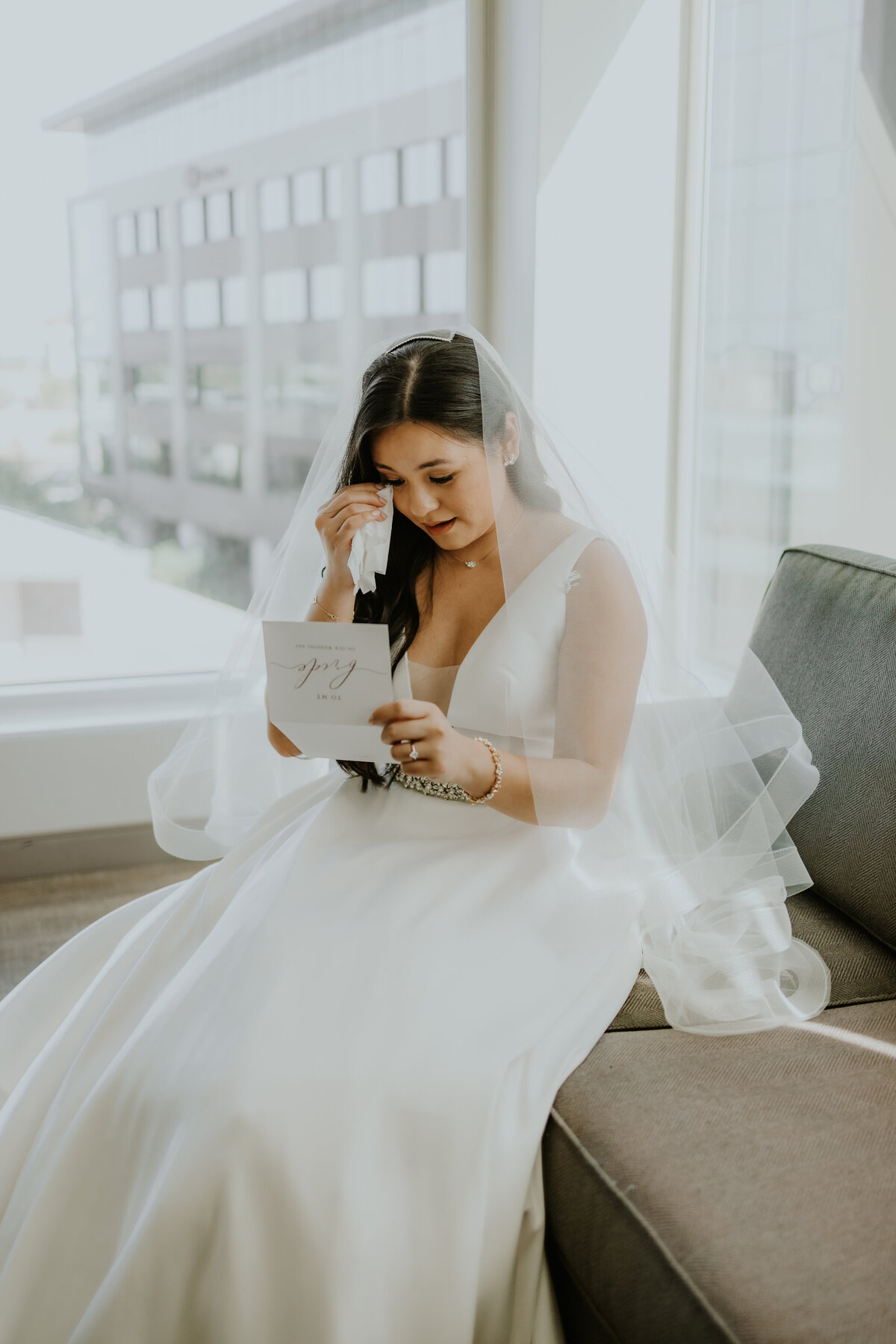 Bride becoming emotional reading vows on wedding day Temecula, California Wedding photographer Yescphotography