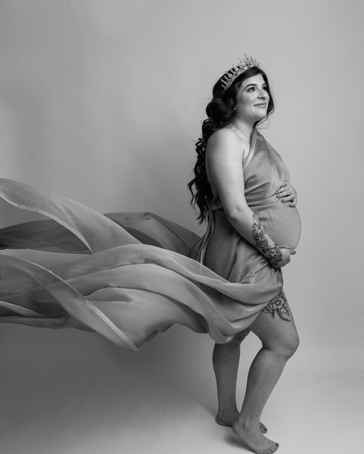 pregnant woman in crown