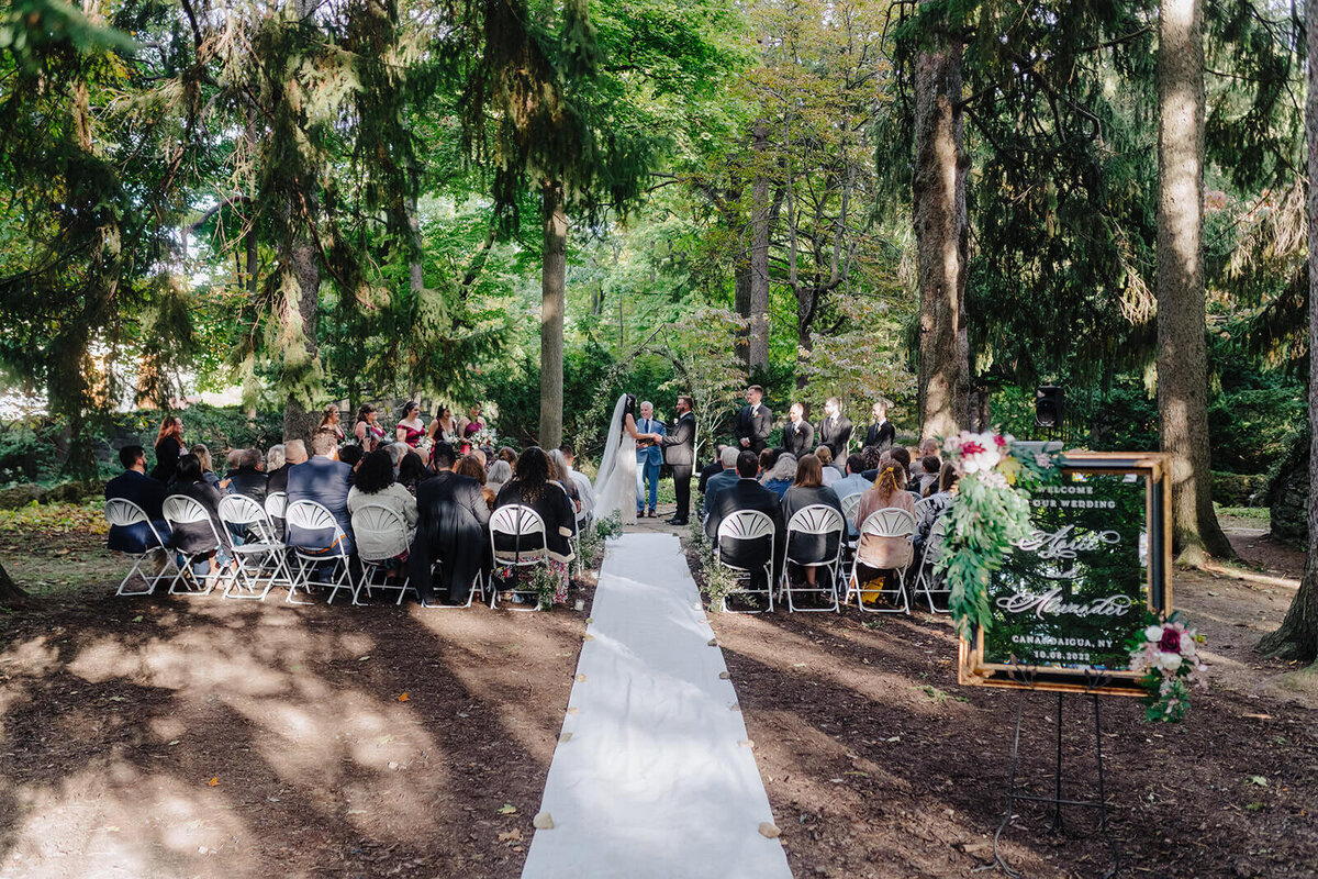 Wedding ceremony at a forest at Finger Lakes wedding, NY