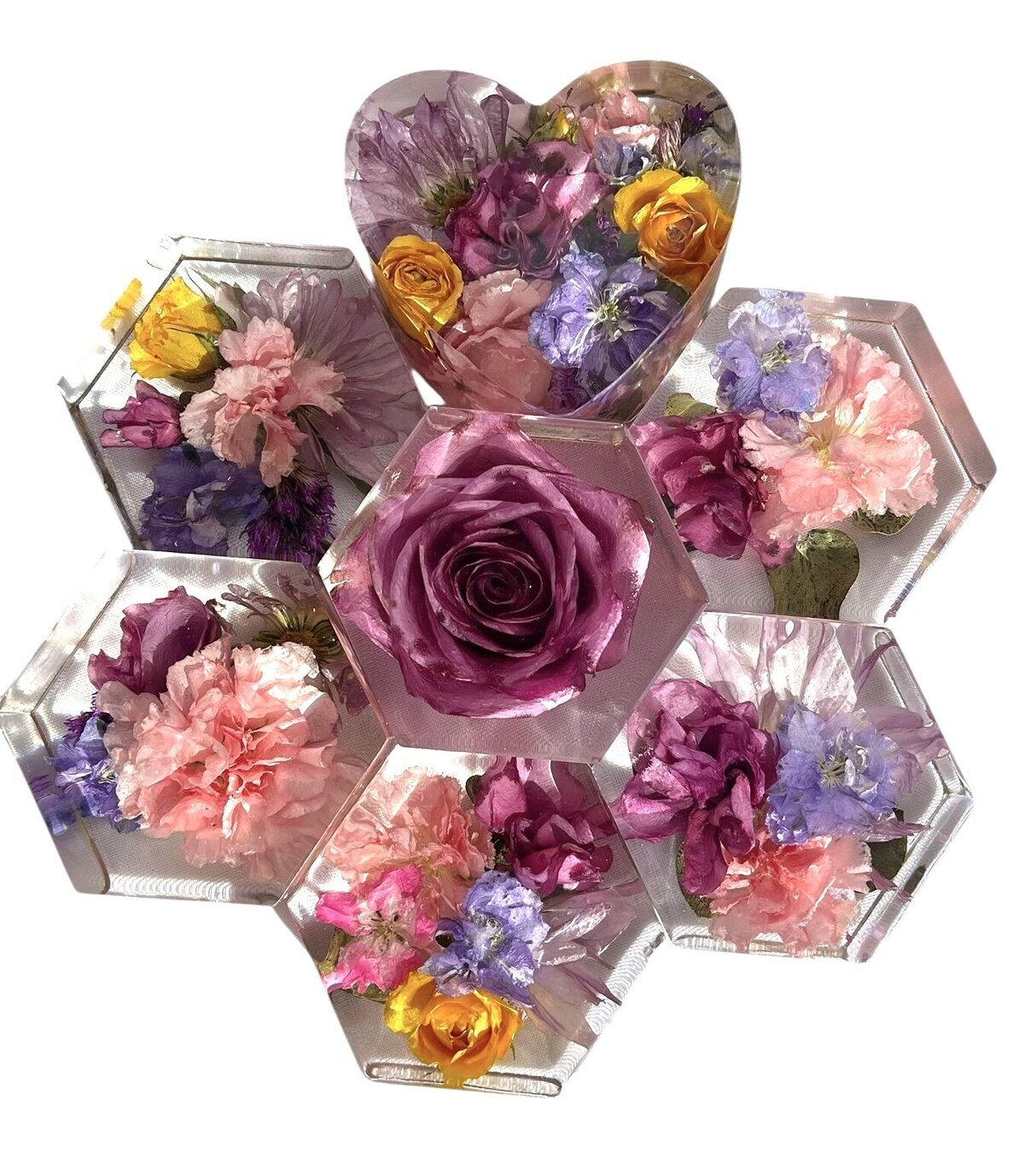 3' hexagon resin blocks with purple pink and yellow funeral flowers preserved for family members and grandchildren as a timeless family keepsake
