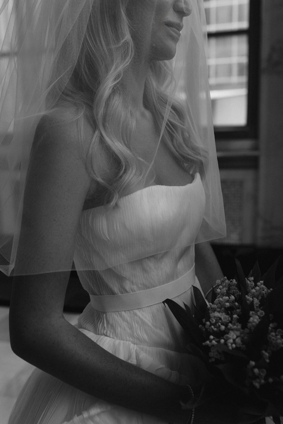 Film photography captures intimate ceremony moments at Old Post Office Chicago with Lauren Alatriste's editorial wedding photography approach, showcasing architectural grandeur while maintaining fashion forward styling and authentic emotional storytelling.