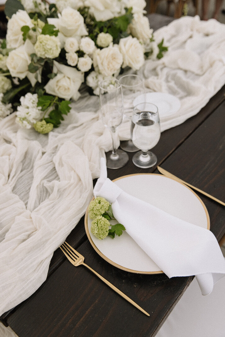 snow balls, tie knot napkin, gold flatware, cheese cloth