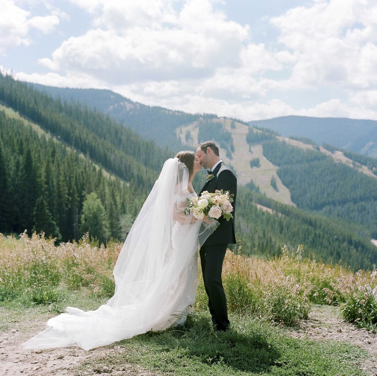 Outdoor Portrait of Bride and Groom in Mountains