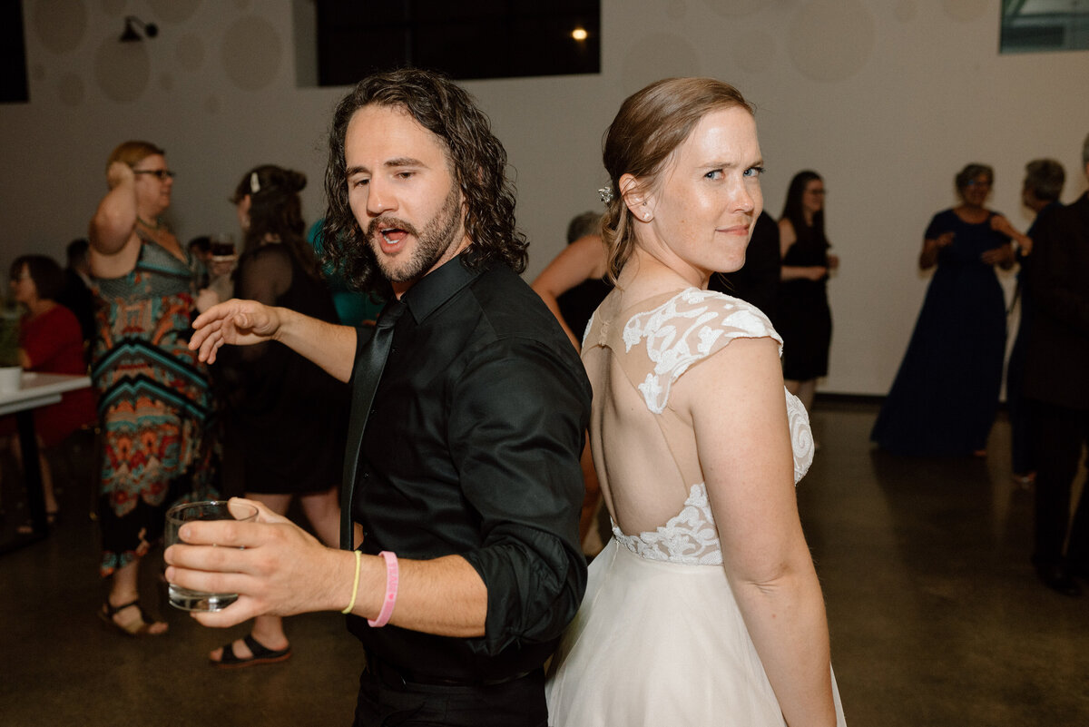 bride with her bridesman on the dancefloor