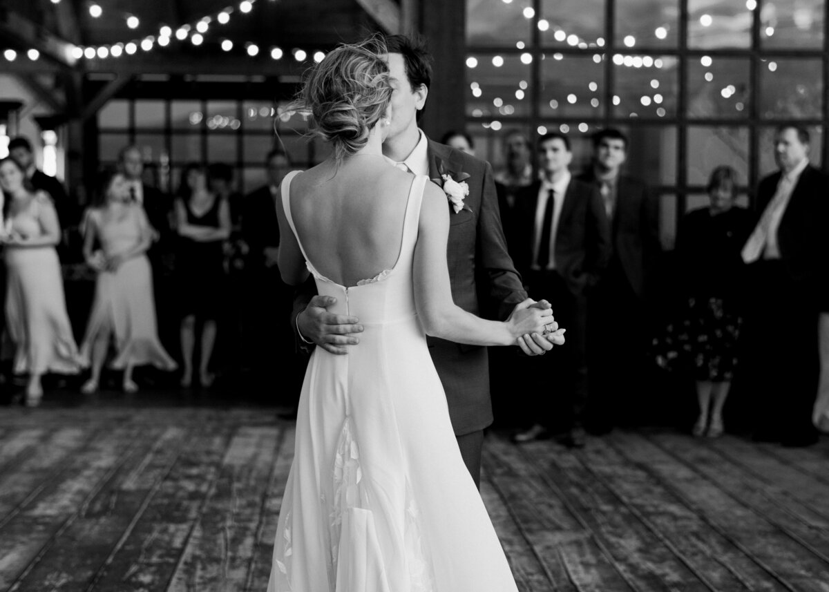 Virginia wedding photographer artfully photographs a couple in black and white during their first dance together