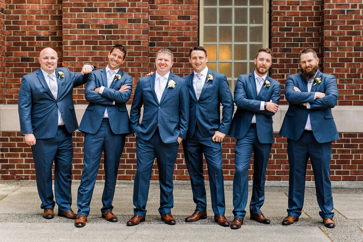 Happy-groomsmen-at-wedding-in-Snohomish-WA-wearing-blue-suits-and-brown-shoes-photo-by-Joanna-Monger-Photography