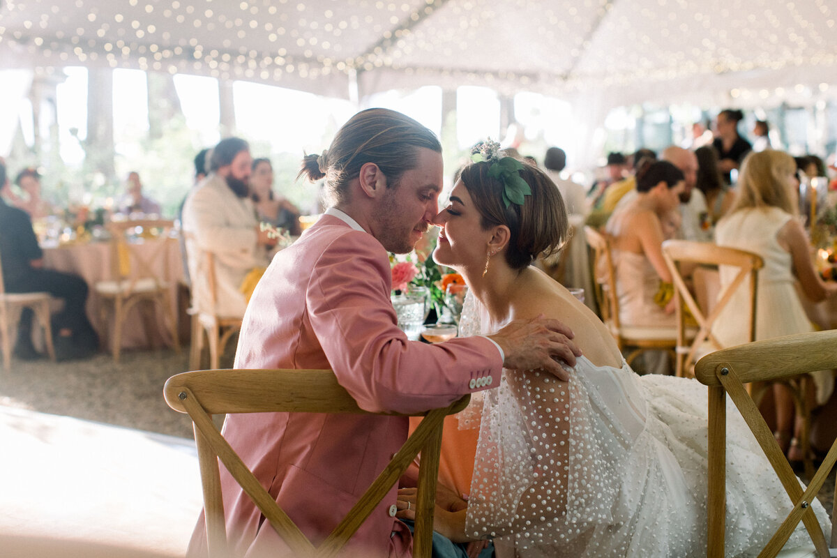 bride and groom at colorful new hampshire wedding reception