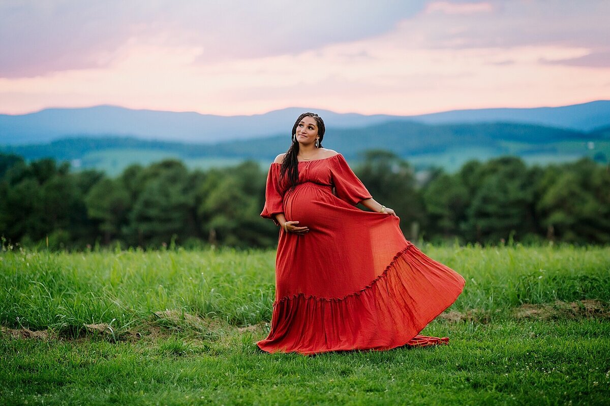 Maternity session in red dress with sunset in Harrisonburg, VA