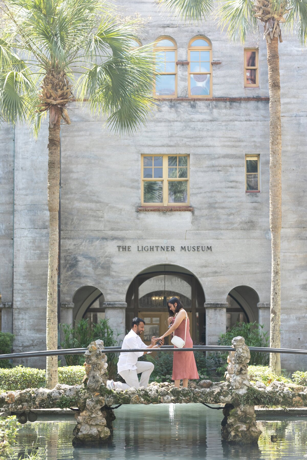A surprise proposal while visiting the courtyard at the Lightner Museum, St. Augustine, Florida | Florida Proposal Photographer