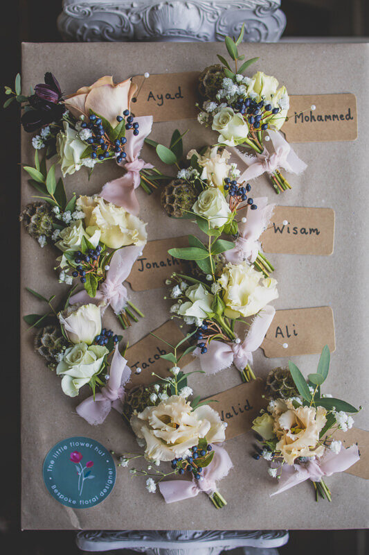 Delicate grooms button hole wedding flowers by the little flower hut