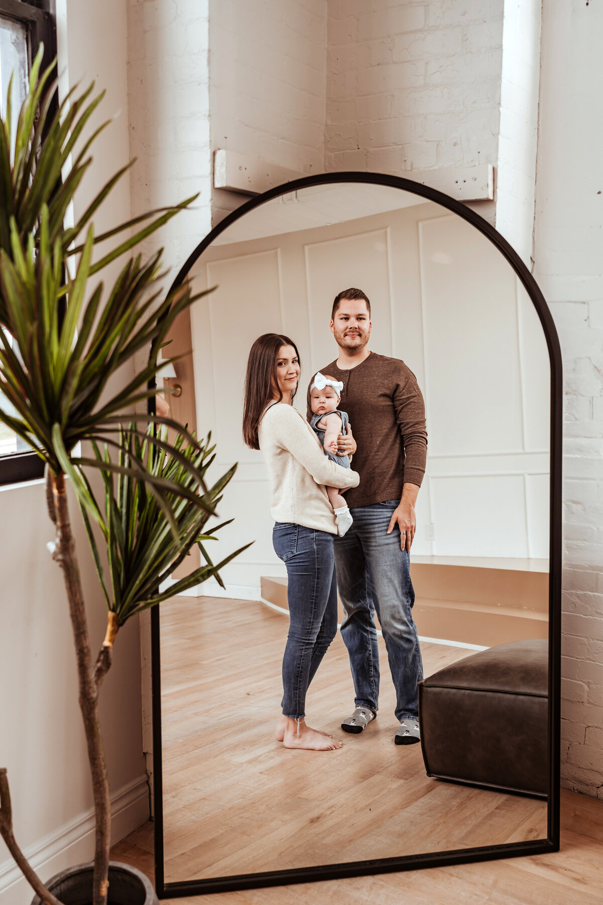 Family looking in mirror