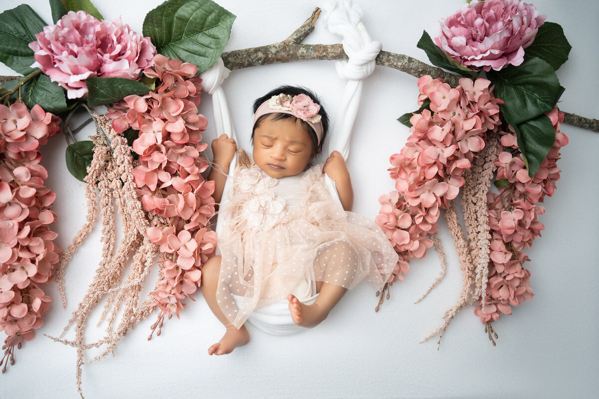 25 Charlotte newborn photography props
swing with flowers