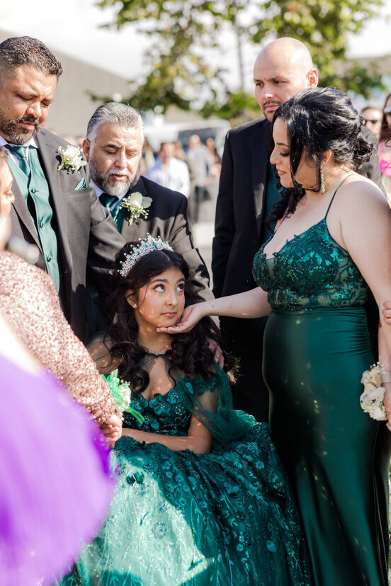 quinceanera-family-praying-over-girl