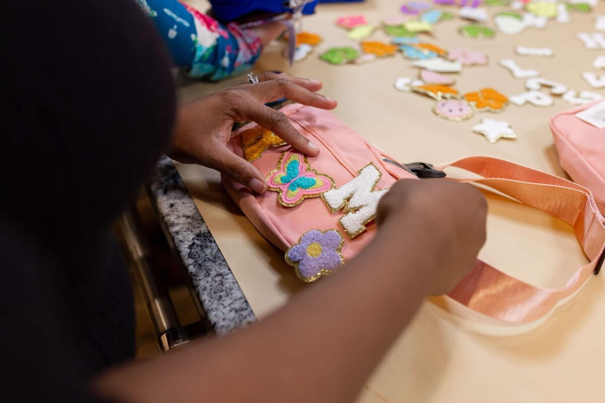 woman designing a custom fanny pack