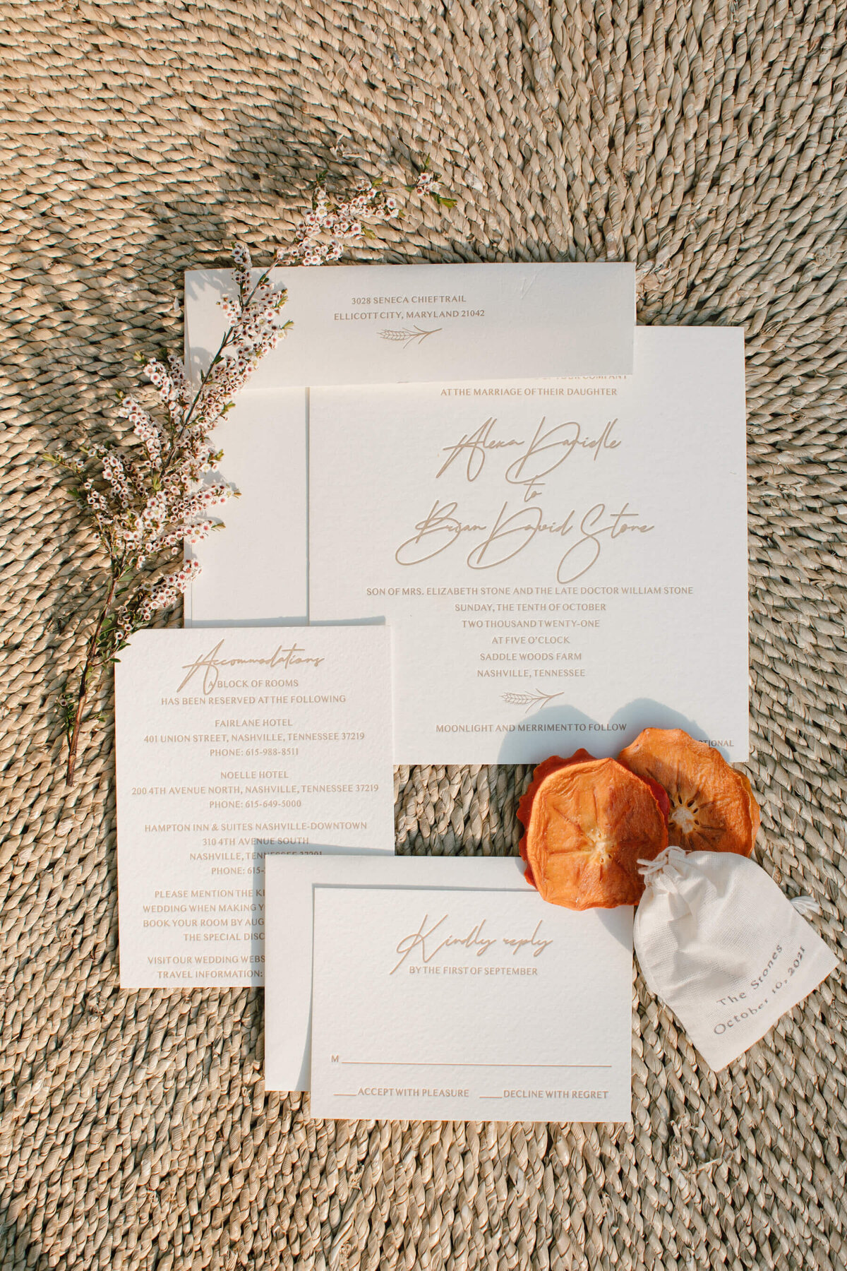 Letterpress wedding invitations with handwritten font for names  on rattan charger