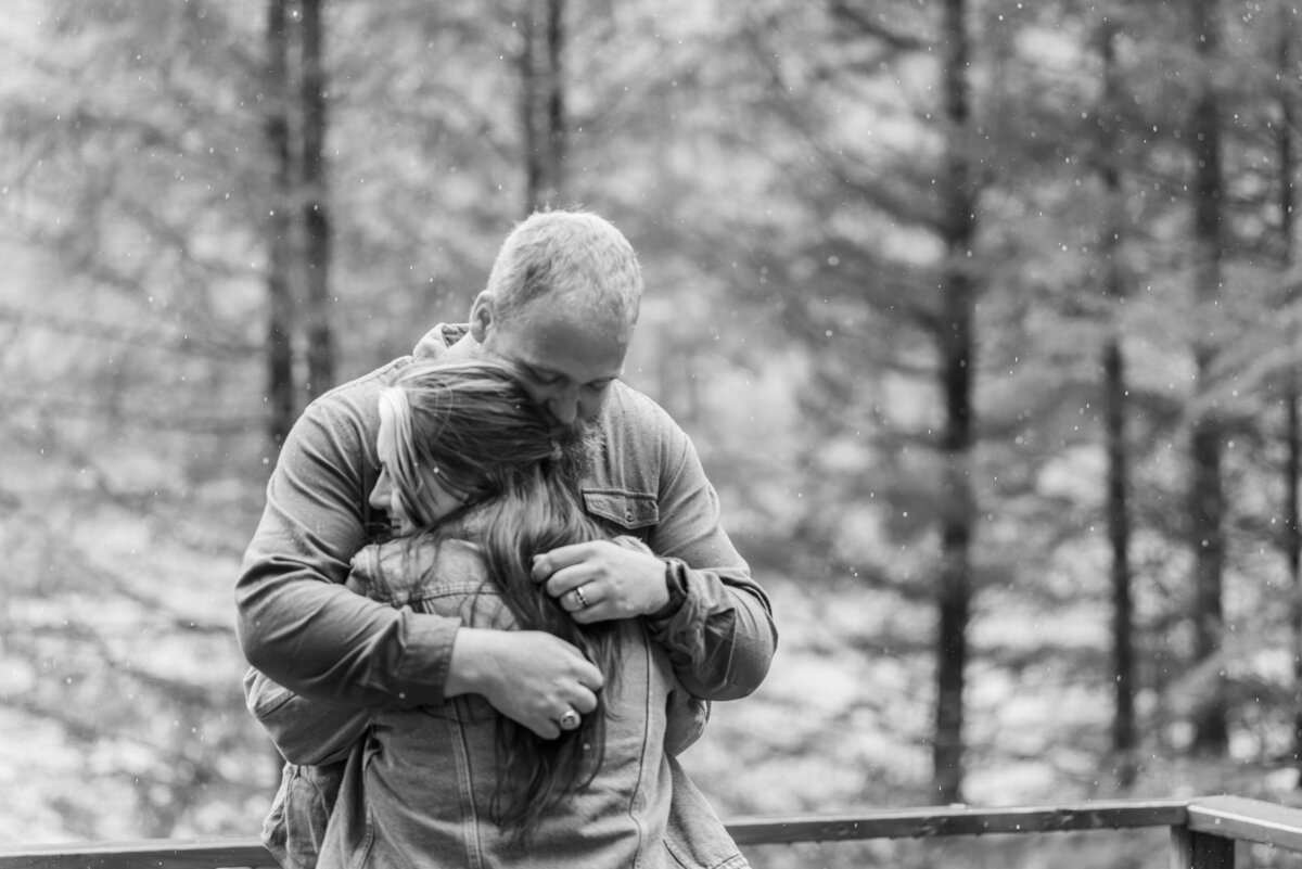 couple hugging under rain