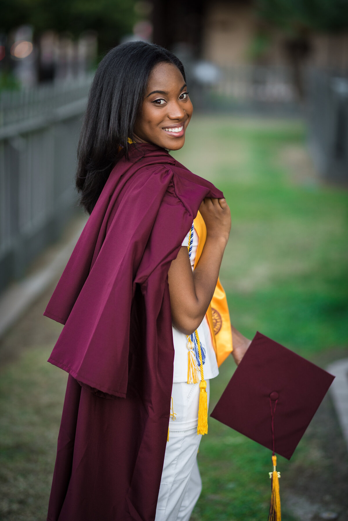 African American girl with cap and gown