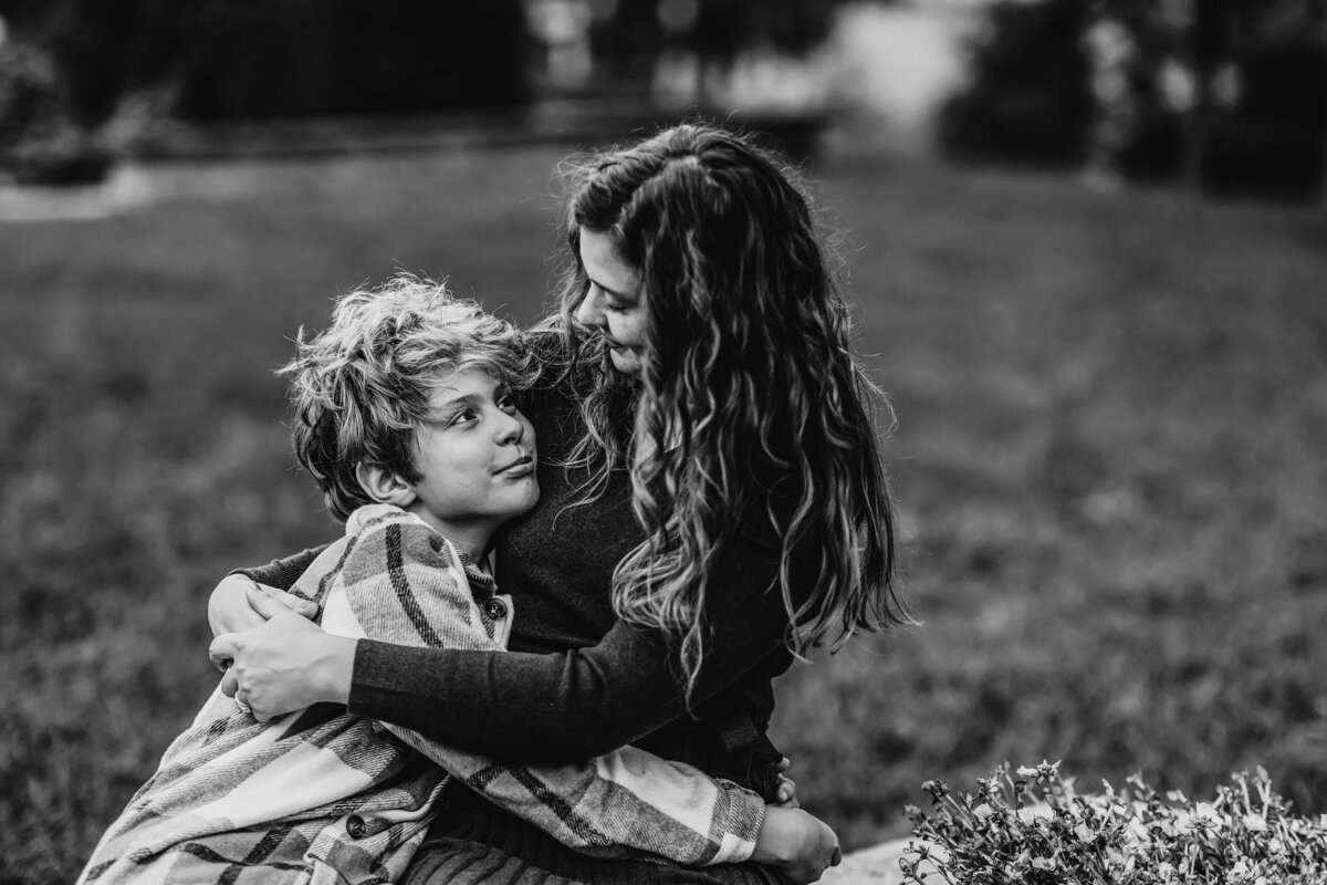 mother and her son love bw