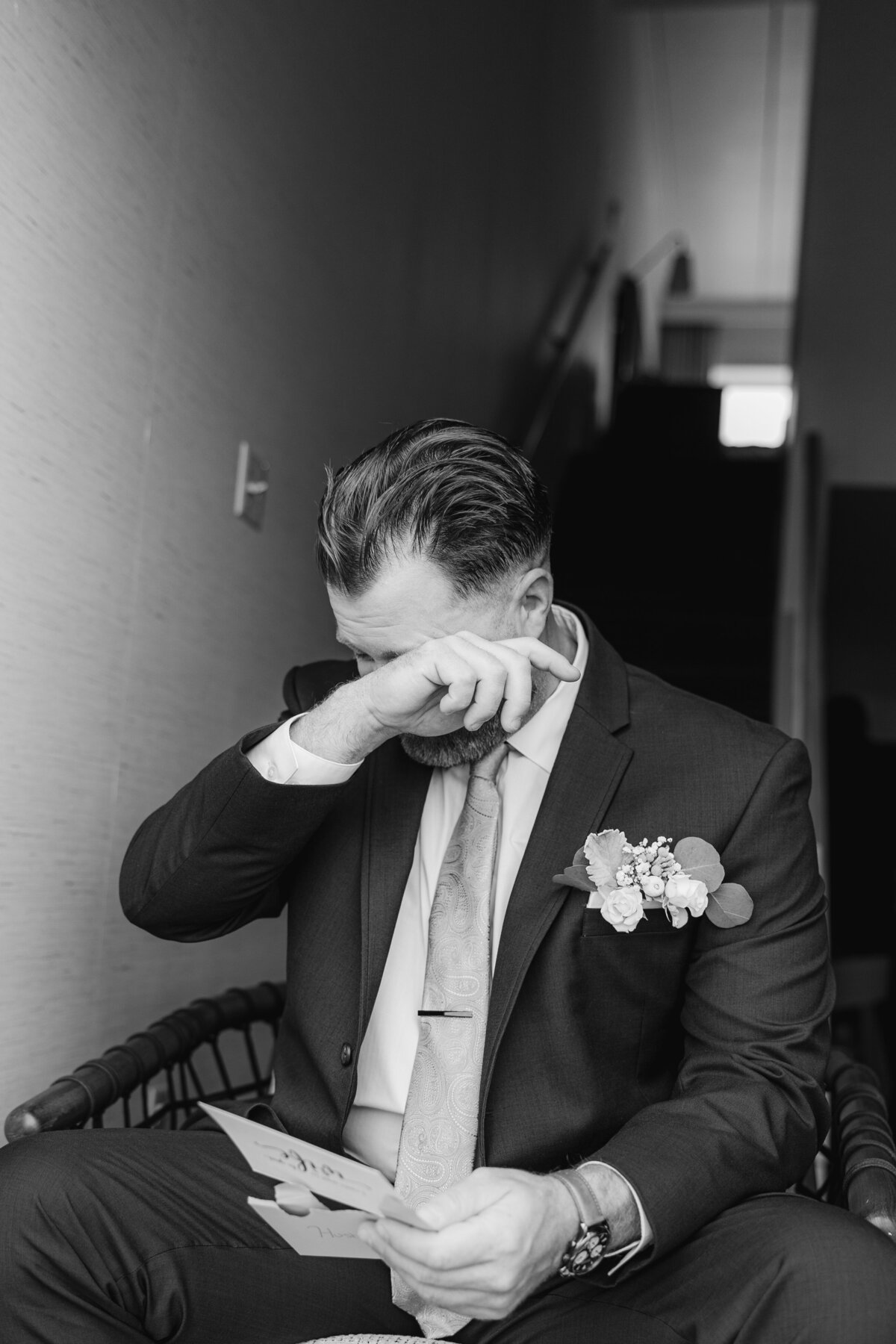 groom having an emotional moment prior to Newport wedding ceremony