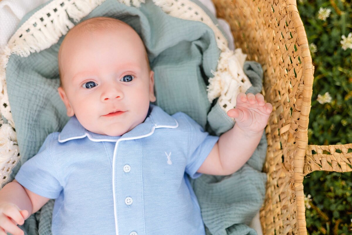 little boy smiling at his parents