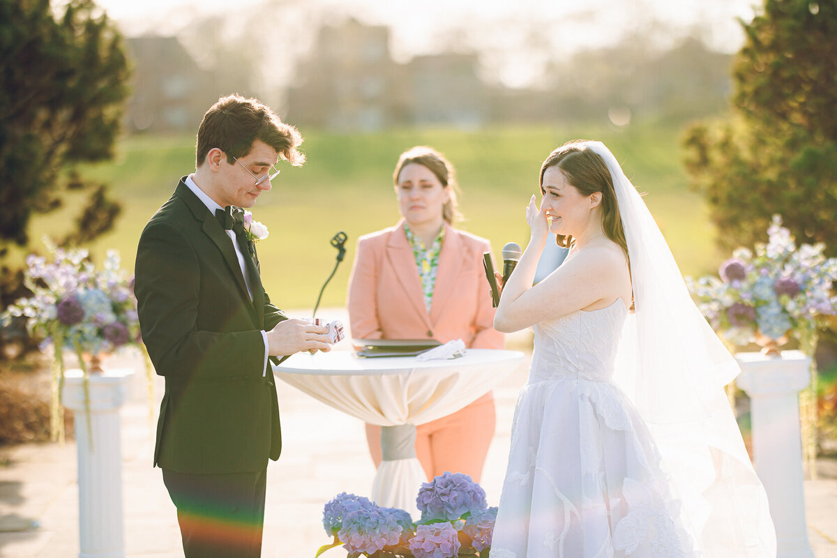 A couple shares some tears of joy during their ceremony at the Garfield Park Conservatory in Chicago
