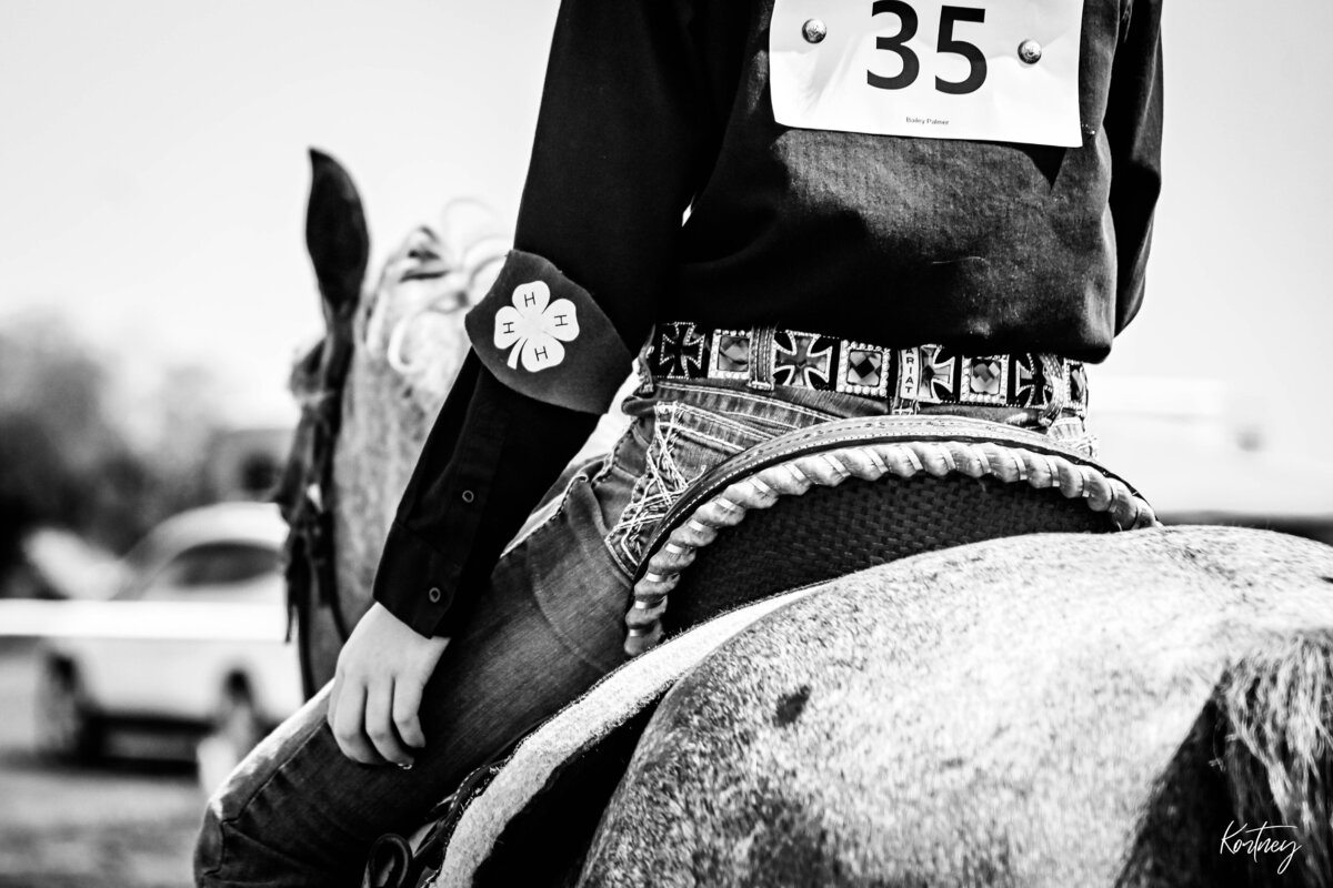 close up of girl on saddle