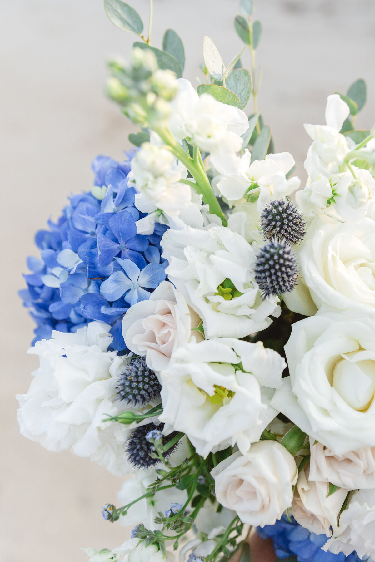 White, blue , and blush wedding bouquet