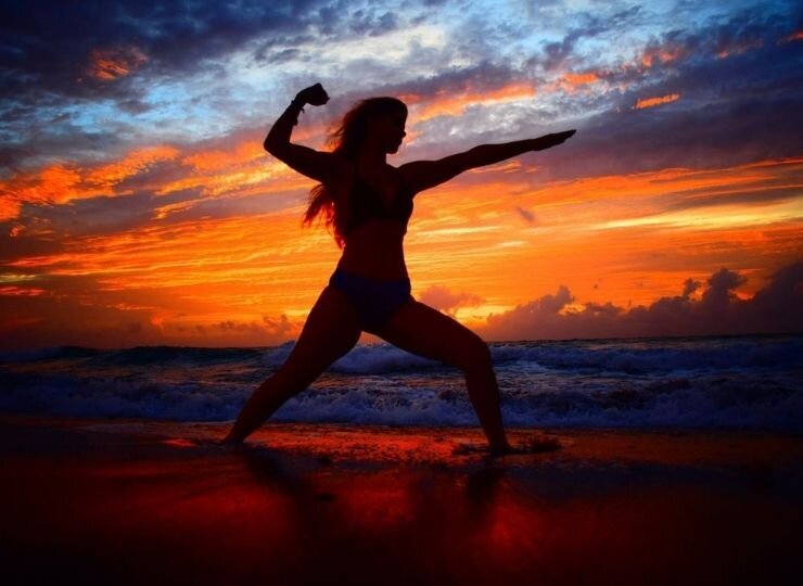 beautiful-women-beach-sunrise-florida-yoga-blue-orange-sky