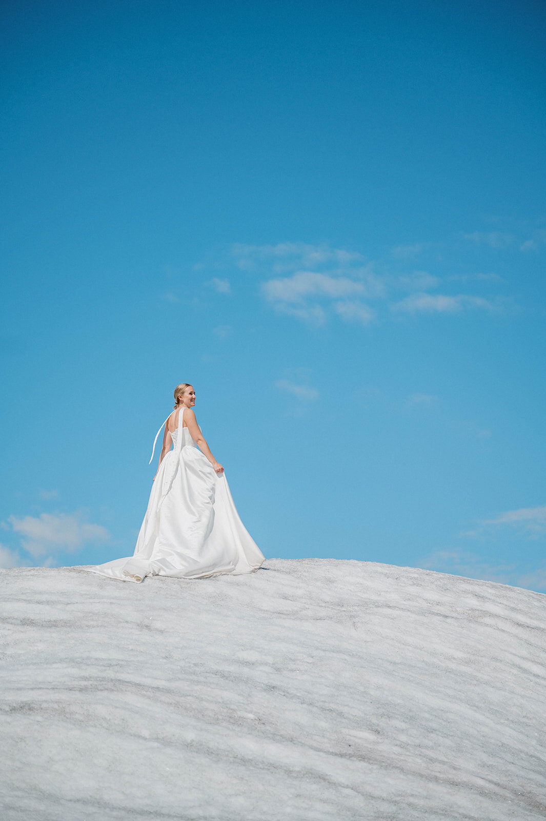 bride stand on the glacier