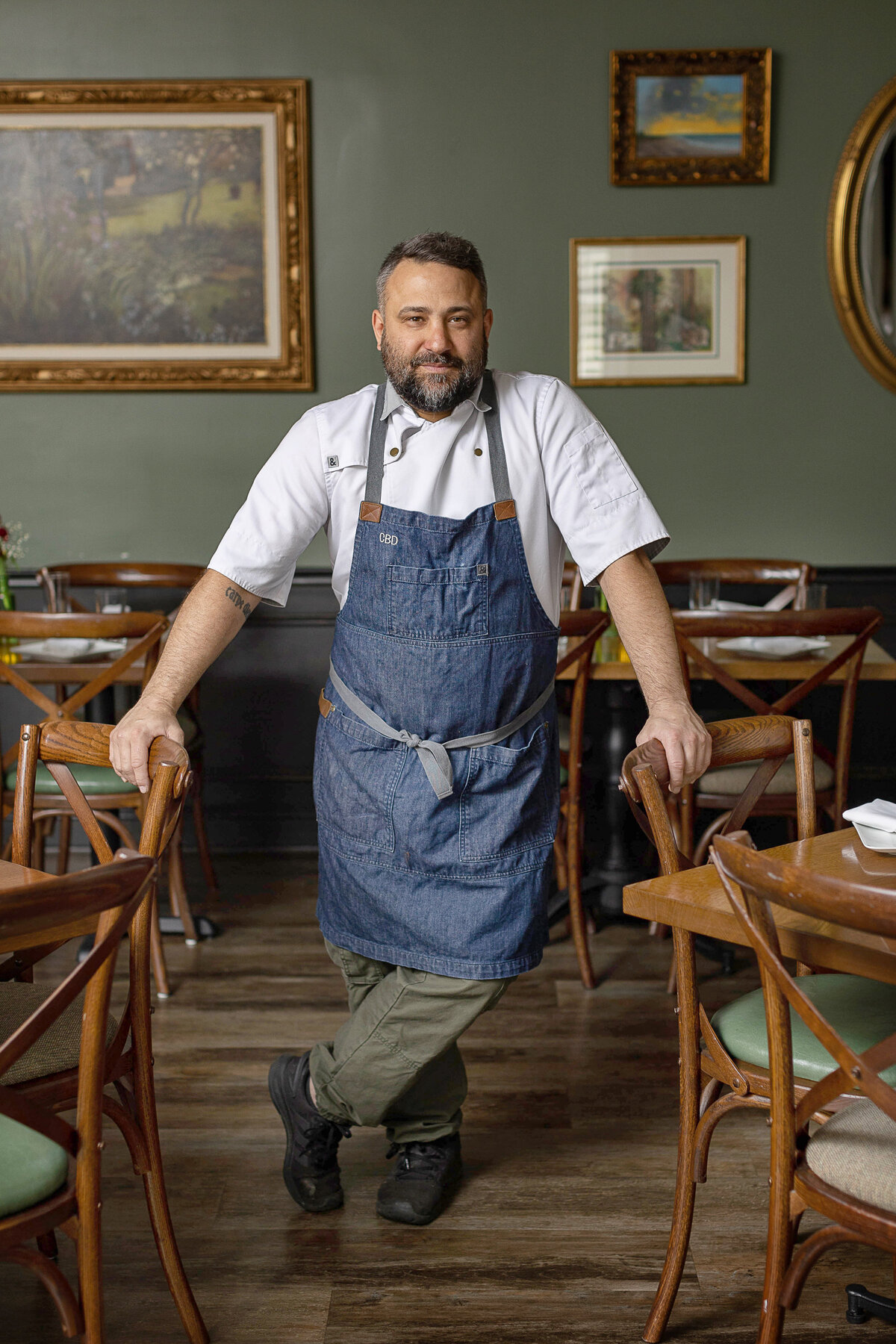 Chef standing in his restaurant